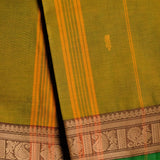 Handwoven Green Devi Consecrated cotton saree with golden beige peacock paisley design border