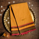 Handwoven Light Yellow Devi Consecrated cotton saree with yellow olive green golden zari border