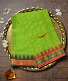 Lime Green Devi Consecrated cotton saree with red and dark green temple border having striped pallu.