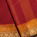 Handwoven Red Devi Consecrated cotton saree having orange and beige border with temple paisley design