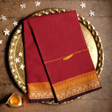 Handwoven Red Devi Consecrated cotton saree having orange and beige border with temple paisley design