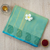 Handwoven aqua blue consecrated cotton saree with a delicately intricate border