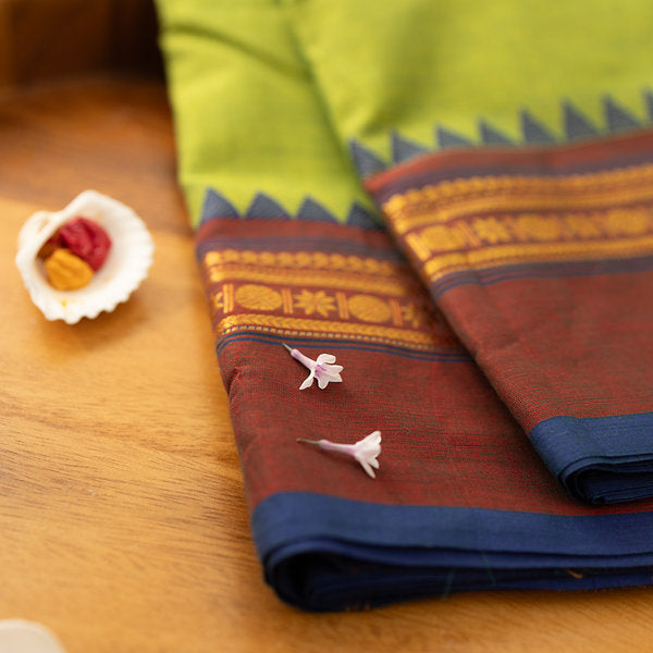 Devi Consecrated Cotton Saree – Lime Green with Maroon & Navy Blue Traditional Woven Border