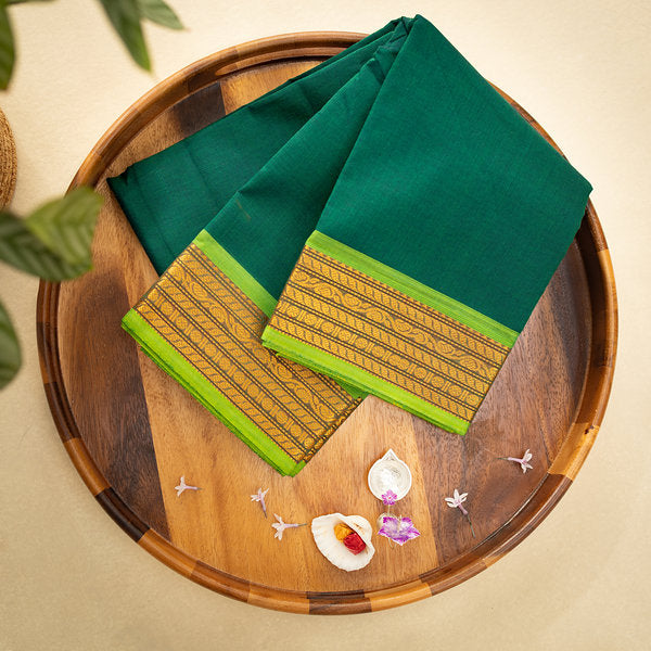Devi Consecrated Cotton Saree – Deep Emerald Green with Golden Yellow & Lime Green Woven Border