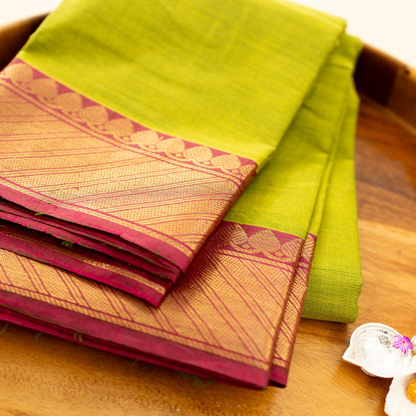 Devi Consecrated Cotton Saree – Lime Green with Golden Pink Traditional Woven Border