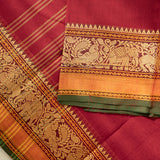 Devi Consecrated Cotton Saree – Deep Crimson Red with Golden Orange & Olive Green Traditional Woven Border