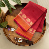 Devi Energised Cotton Saree – Deep Magenta Red with Orange Gold Checked & Traditional Floral Woven Border