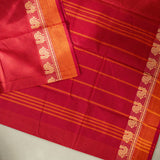 Devi Energised Cotton Saree – Deep Magenta Red with Orange Gold Checked & Traditional Floral Woven Border