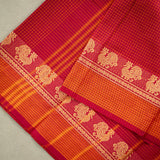 Devi Energised Cotton Saree – Deep Magenta Red with Orange Gold Checked & Traditional Floral Woven Border