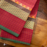 Devi Consecrated Cotton Saree – Deep Maroon Red with Golden Checks & Olive Green Traditional Woven Border