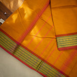 Devi Consecrated Cotton Saree – Golden Orange with Olive Green & Rust Red Woven Border