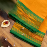 Devi Consecrated Cotton Saree – Saffron Orange with Emerald Green & Golden Woven Border