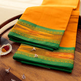 Devi Consecrated Cotton Saree – Saffron Orange with Emerald Green & Golden Woven Border