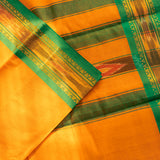 Devi Consecrated Cotton Saree – Saffron Orange with Emerald Green & Golden Woven Border
