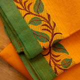 Devi Consecrated Cotton Saree – Saffron Orange with Green Border