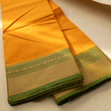 Devi Consecrated Cotton Saree – Golden Orange with Olive Green Zari Border