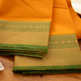 Devi Consecrated Cotton Saree – Golden Orange with Olive Green Zari Border