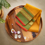 Devi Consecrated Cotton Saree – Golden Mustard Yellow with Green & Rust Red Traditional Border