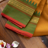 Devi Consecrated Cotton Saree – Golden Mustard Yellow with Green & Rust Red Traditional Border