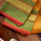 Devi Consecrated Cotton Saree – Golden Mustard Yellow with Green & Rust Red Traditional Border