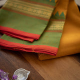Devi Consecrated Cotton Saree – Golden Mustard Yellow with Green & Rust Red Traditional Border