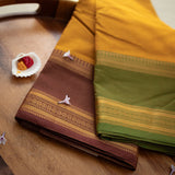 Devi Consecrated Cotton Saree – Golden Mustard Yellow with Olive Green & Chocolate Brown Traditional Border