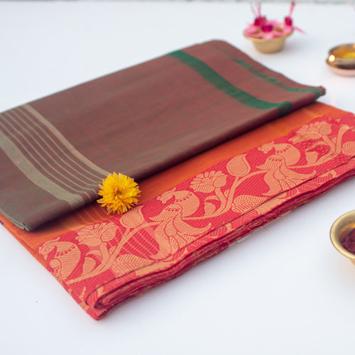 Green Devi Consecrated pure cotton saree with magenta animal motifs border and striped pallu