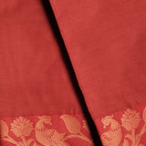 Maroon Devi Consecrated cotton saree with olive green border and striped pallu.