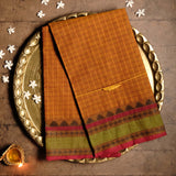 Handwoven Orange Devi Consecrated cotton saree having solid olive green with temple design border